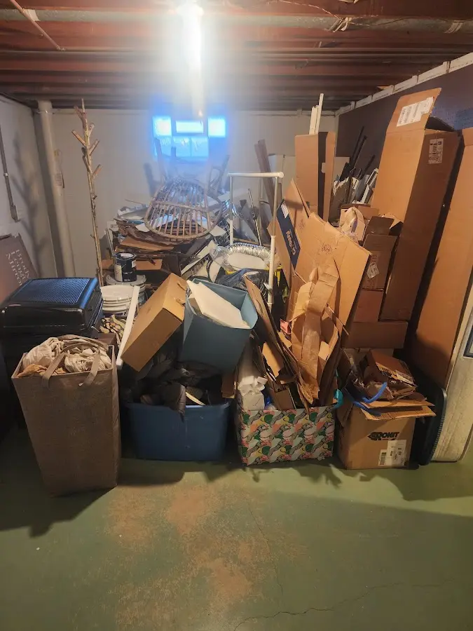 Roll-off dumpster container at job site for Roll Off Dumpster Rental in Weston